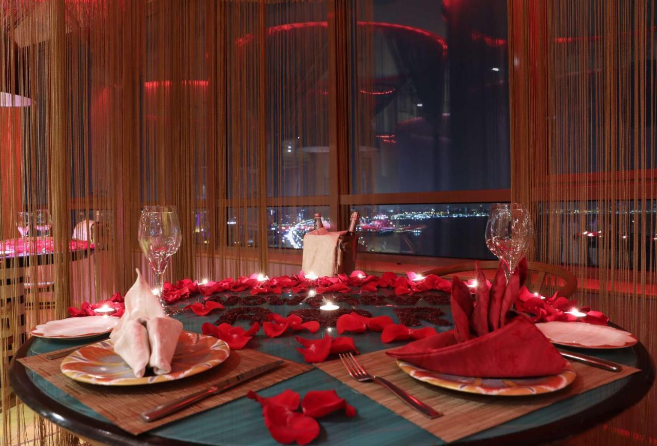 Symphony Style Hotel Kuwait Salmiya Екстер'єр фото A table set for a romantic dinner